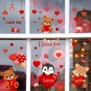 Valentine's Day bear and heart window clings for glass decoration on white window frame