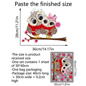Detail view of cartoon owl wall stickers with snowflakes and hearts for holiday decoration