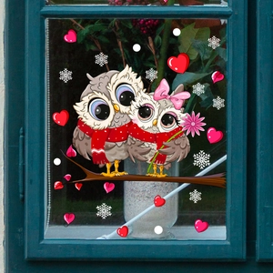 Cartoon owl window decals with red hearts and snowflakes for festive home decoration