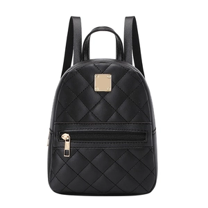 Chic black quilted mini backpack with gold hardware and rhombic pattern detailing