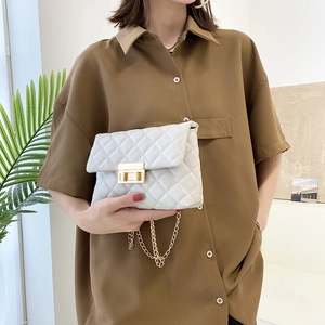 Quilted white chain crossbody bag with golden square lock and elegant leather texture