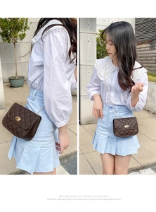 Brown quilted crossbody bag with gold fish-mouth lock and vintage chain strap detail