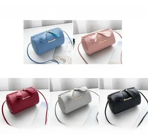 Five colors of lychee pattern mini barrel crossbody bags with bow zipper charms