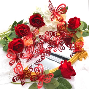 Set of 12 red glitter hollow butterfly wall stickers with heart patterns for Valentine decor