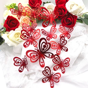 Set of 12 sparkling red 3D butterfly wall stickers with glitter and hollow out heart patterns