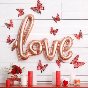 Rose gold LOVE balloon set with butterfly wall stickers and candles for party decor
