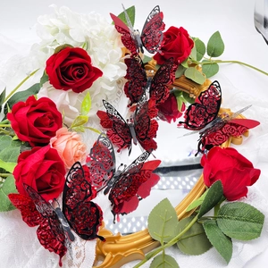 Detailed view of red hollow butterfly wall stickers with rose patterns and glitter finish