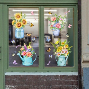 Floral window stickers with sunflower and butterflies on a green wooden window frame