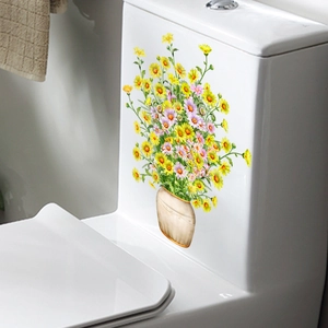 Adhesive daisy flower decals on toilet tank featuring yellow daisies in a beige vase