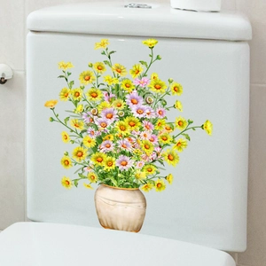 Watercolor yellow daisy flower vase wall sticker decor on a white ceramic toilet tank