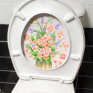 Floral wall sticker featuring pink flowers and purple lavender in a golden vase on a toilet