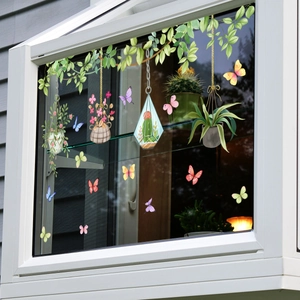 Double-sided green vine plant and floral window stickers with colorful butterflies