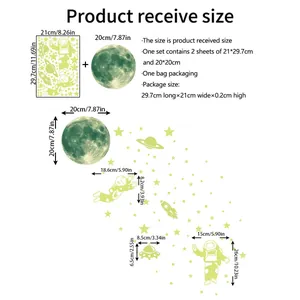 Luminous wall sticker size chart showing planet and astronaut dimensions in cm and inches