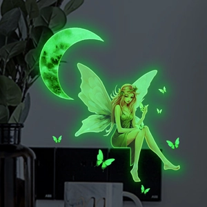 Detailed glow-in-the-dark wall stickers featuring fairy and moon in luminous green light