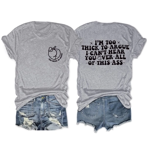 Flat lay of gray cotton T-shirt with back slogan print and distressed denim shorts