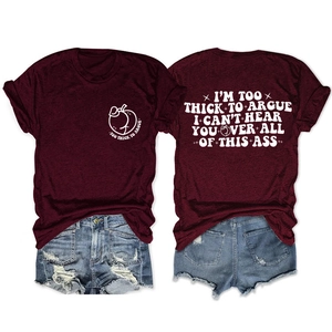 Detail of burgundy T-shirt back print and distressed denim shorts with frayed hems