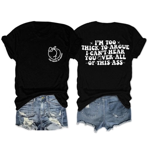 Flat lay of black cotton T-shirt with back slogan print and ripped denim shorts