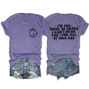 Flat lay of purple cotton t-shirt with peach logo and distressed blue denim shorts