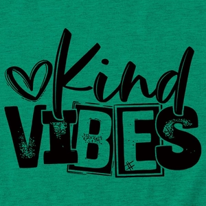 Detailed macro view of black Kind Vibes screen printing on green cotton t-shirt fabric