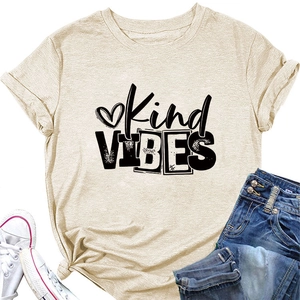 Detail of Kind VIBES slogan print on beige short sleeve t-shirt with heart graphic