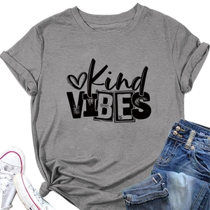Detail view of grey cotton T-shirt featuring Kind VIBES print and stylish side knot