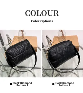 Détail du sac bandoulière matelassé noir avec zip doré et deux types de motifs surpiqués