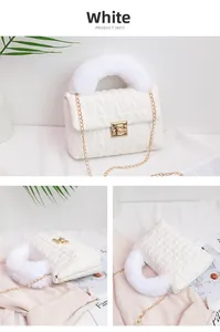 Detailed view of white quilted handbag with fluffy handle and gold chain strap