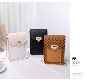 Close-up of stylish printed crossbody phone bags with gold chain straps in multiple colors