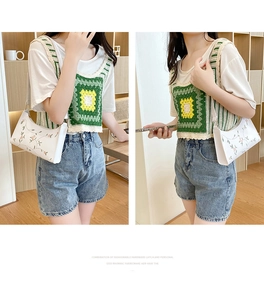 Chic white half-moon underarm bag with delicate pink floral embroidery detail