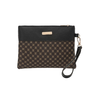 Classic floral print handbag with black leather panel and gold hardware details