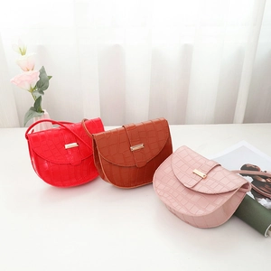 Fashionable crocodile pattern saddle crossbody bags in red, brown, and light pink colors