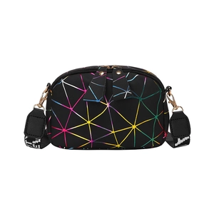 Black crossbody bag with colorful geometric patterns and adjustable wide shoulder strap