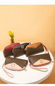 Set of five elegant semi-circular wristlet clutch bags in five classic assorted colors