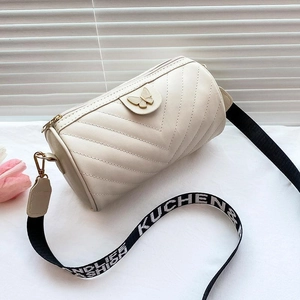 Quilted V-pattern cylinder bag in cream white with butterfly clasp and wide logo strap