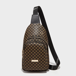 Fashionable monogram chest bag in dark brown faux leather with gold hardware and strap