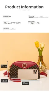Detail view of monogram shell crossbody bag with red leather trim and size information
