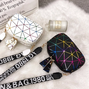 Women's geometric crossbody camera bag with triangle pattern and wide shoulder strap