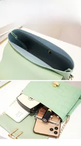 Vista dettagliata della borsa verde menta motivo coccodrillo con interno capiente