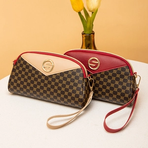 Retro monogram shell clutches in beige and burgundy leather with gold circular logo