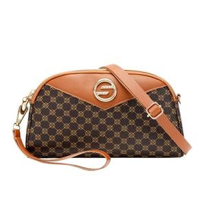 Elegant brown shell-shaped crossbody bag with clover pattern and gold metal hardware