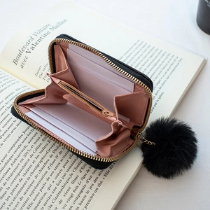 Black woven texture coin purse with pompom charm and multi-slot interior organizer