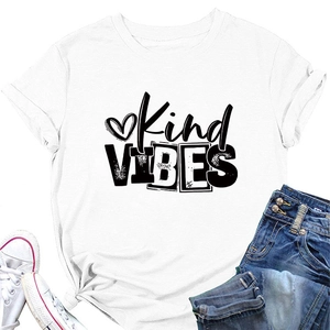 Detailed view of Kind Vibes slogan print and heart design on white cotton t-shirt