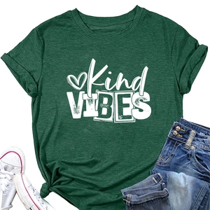 Detail of green Kind VIBES t-shirt with knotted hem, denim shorts and white canvas sneakers