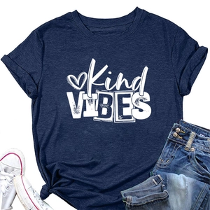 Flat lay of navy Kind Vibes t-shirt with heart graphic and knotted hem detail