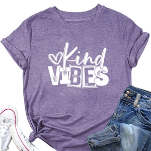 Detail of Kind Vibes text print and heart graphic on purple cotton t-shirt with rolled sleeves
