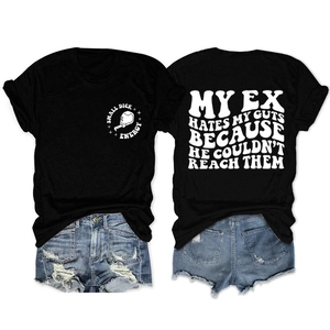 Detail view showing front and back of black graphic tee with denim shorts on white background