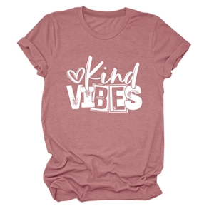 Detailed view of Kind Vibes white slogan and heart print on a mauve cotton blend t-shirt