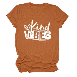 Detail of burnt orange crew neck T-shirt featuring Kind VIBES text and heart print