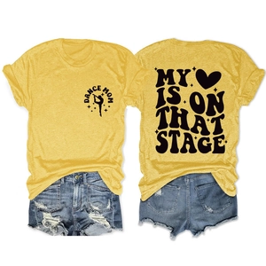 Front and back detail of mustard yellow cotton T-shirt with My Heart Is On That Stage print