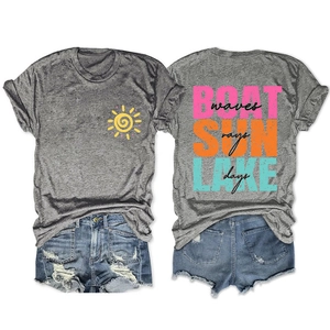 Detail of grey t-shirt featuring 'Boat waves, Sun rays, Lake days' graphic on the back